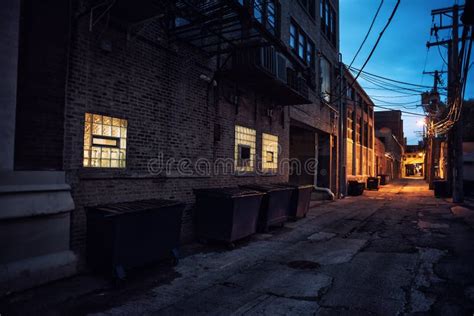 Dark And Scary Downtown Urban City Street Alley Scene At Night Stock