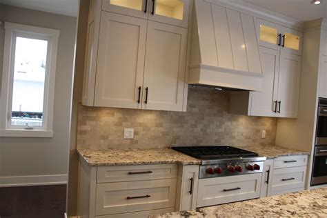 Additionally, beyond just the total cost for each material, consider what materials will wear well and which ones fit your preferred style best. Custom kitchen cabinets with custom built range hood. Wolf ...