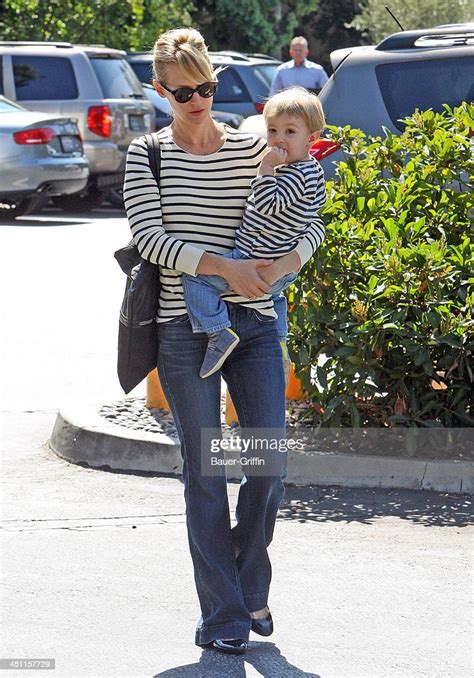 January Jones Carries Her Son Xander Dane Jones On September 25 2013