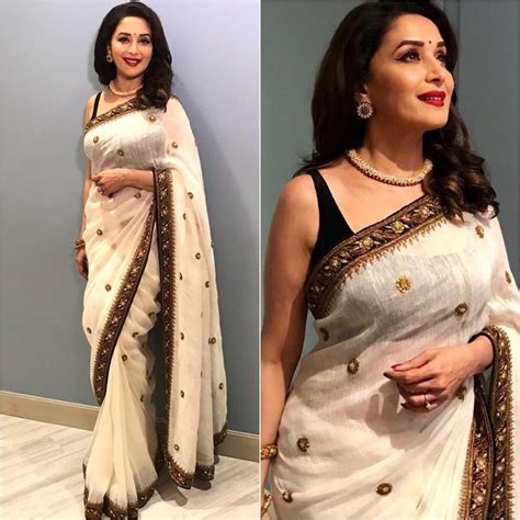 Ever Graceful And Poised Madhuri Dixit Nene Stills In A White Saree Embellished With