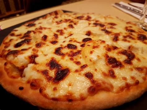 Four Cheese Pizza Picture Of Cafe De La Comedie Paris Tripadvisor