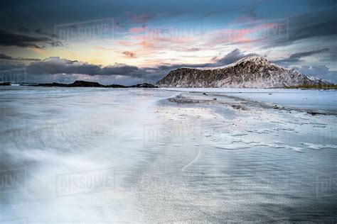 Sunset Over Frozen Waves Of The Arctic Sea Skagsanden Beach Flakstad