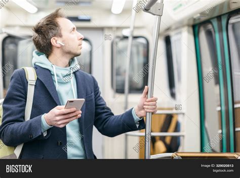Young Man Ride Subway Image & Photo (Free Trial) | Bigstock