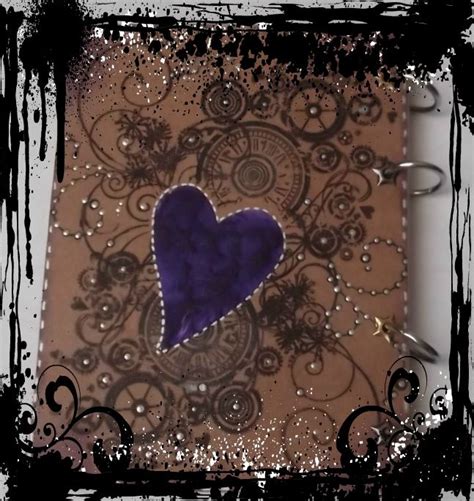 A Small Notebook With A Purple Heart On The Cover And Black Swirls