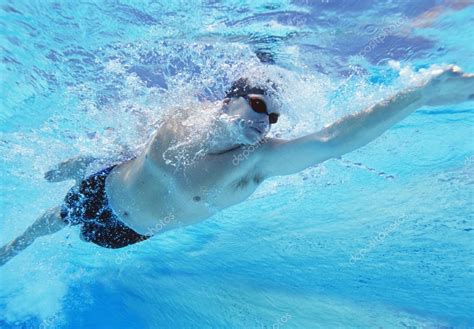 Male Athlete Swimming In Pool Stock Photo By ©londondeposit 33987021