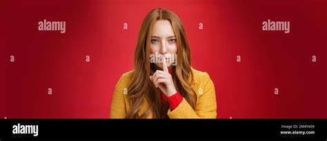 Shh Keep Out Secret Safe Portrait Of Sensual Attractive And Daring Redhead Female In Yellow