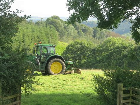 Mowing The Grass To To Hay At Farm Bandb Devon Huxtable Farm