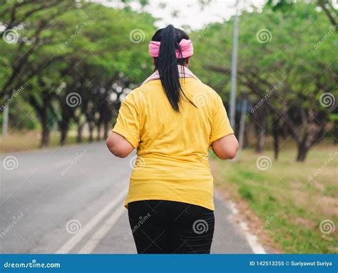 Overweight Woman Running In The Park Weight Loss Concept Stock Image Image Of Adult