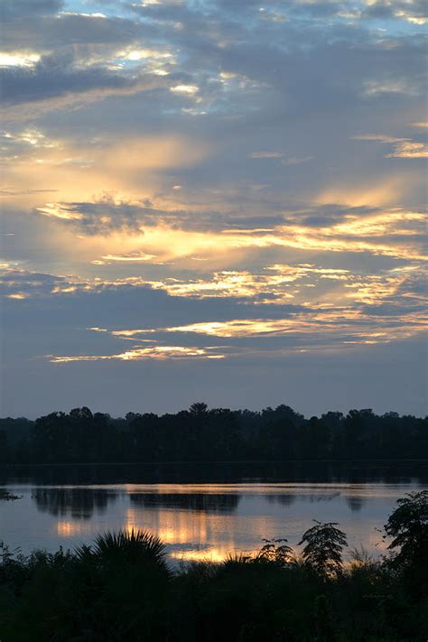 Clouds And Sunrise Over Alligator Lake Photograph By Rd Erickson Pixels