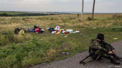 Malaysia Airlines Crash Dead Moved From Mh17 Site Bbc News