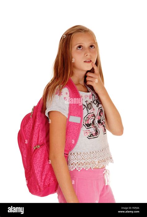 A Blond Pretty Girl Standing With Her Pink Backpack For School Looking
