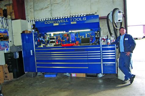 A set of six side cabinets; Schaeffer Automotive owner John Schaeffer shows off his ...