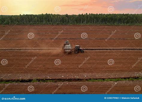 Peat Harvester Tractor On Collecting Extracting Peat Mining And