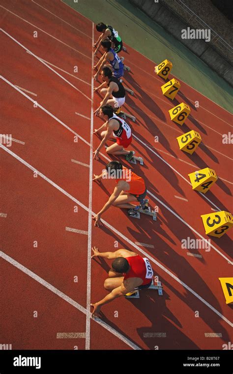 Runners At Starting Line Stock Photo Alamy