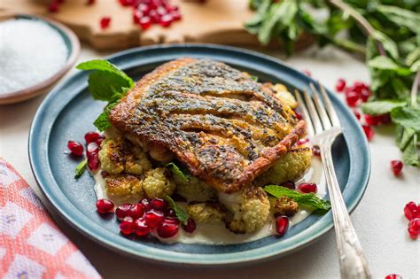 Pan Seared Barramundi With Cauliflower Tahini And Pomegranate The