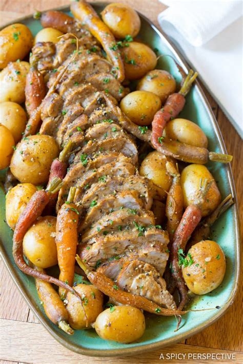 So easy to prepare, the wine sauce cooks right along with the roasting meat. Crock Pot Pork Loin with Vegetables - A Spicy Perspective