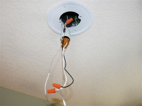 Cut a temporary access hole in the wall and fish wires from the fixture mount in the ceiling to the temporary hole, and. How to replace a recessed light with a ceiling light ...