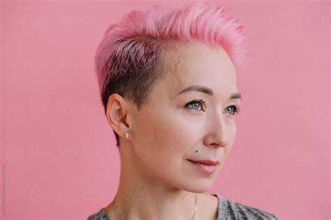Side View Headshot Portrait Of Woman With Short Pink Hair By Pink