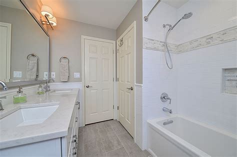 Then, we used the same tin idea for our shower walls. Carl & Susan's Hall Bathroom Remodel Pictures | Home ...