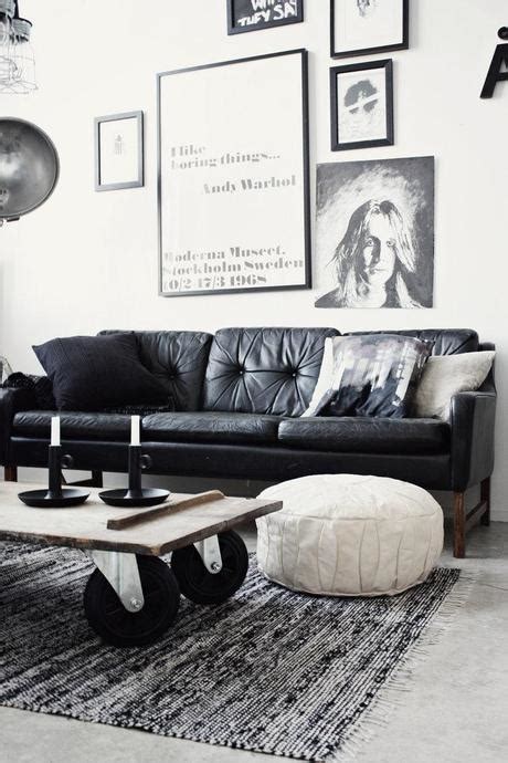 This is a small living room with just one sofa directly facing the tv. How To Decorate A Living Room With A Black Leather Sofa - Decoholic