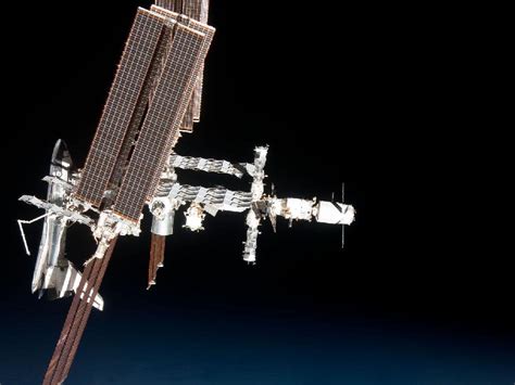 Nasa The International Space Station And The Docked Space Shuttle