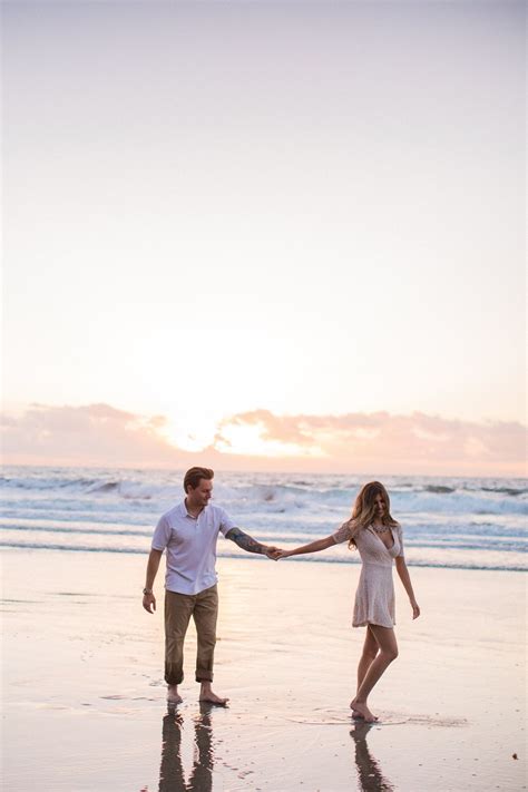 Sunset Beach Engagement Picture Couple Dancing By The Ocean Couple Beach Pictures Beach