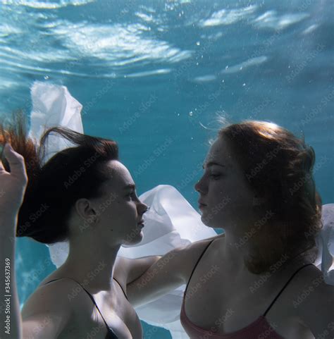 Two Beautiful Lesbian Girls Are Swimming Underwater Attractiveness Sexual Poses And Gestures