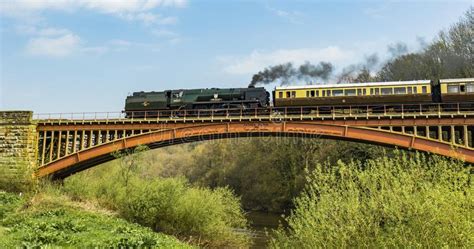 Historic Steam Train Traveling Over The Victoria Bridge Editorial