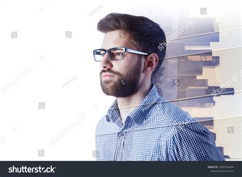 Young Businessman On Abstract City Background Stock Photo 1082316044
