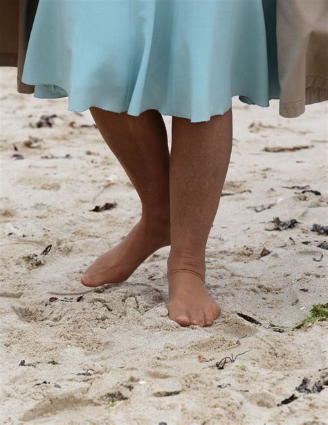 Photos Shoeless Duchess Of Cornwall Tiptoes Through The Sand The Star