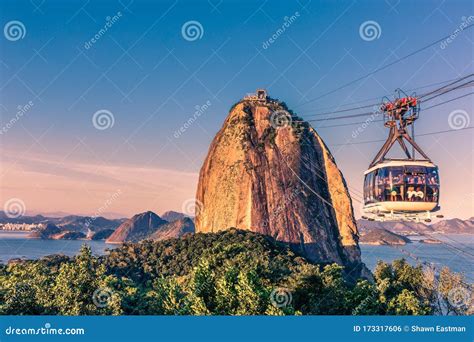 Cable Car Of Tourists Being Transported To The Peak Of Sugarloaf