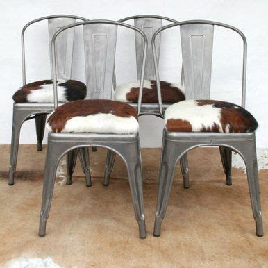 Cowhide ottoman can be amazing piece for home and office seating. Image result for cowhide cushion chair | Home bar ...
