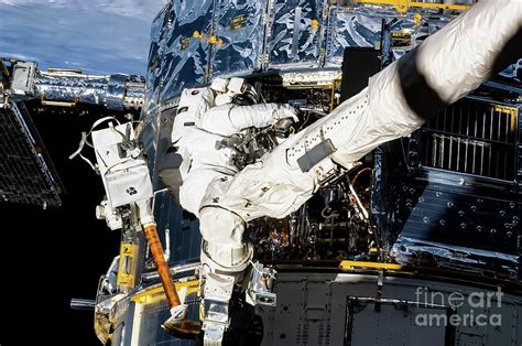Astronaut Working In Space Photograph By M G Whittingham Pixels