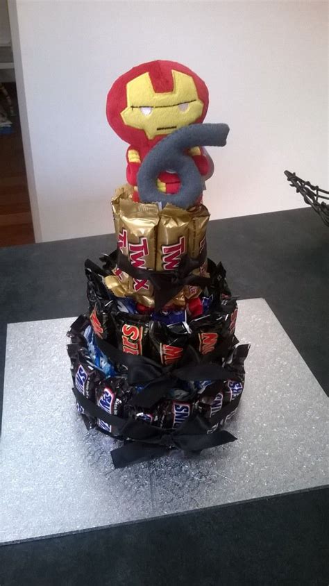 The traditional gift for your 6th wedding anniversary is sugar. Chocolate bar cake. Iron man topper. 6th wedding ...