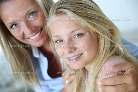 Mother With Teenaged Daughter Stock Photo By ©goodluz 38960355