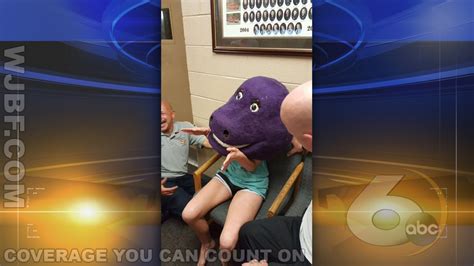 Say What Teen Gets Stuck Inside Head Of Barney Costume