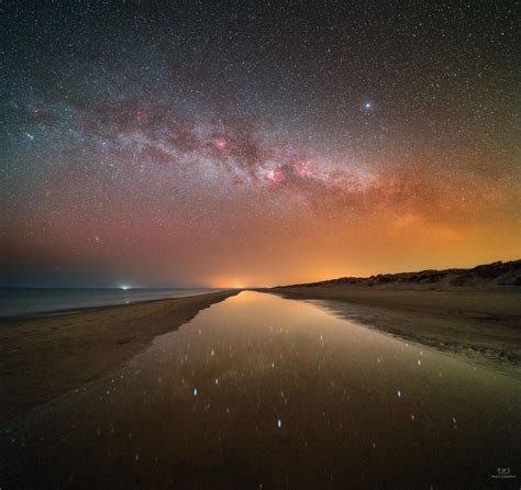 Destination Of The Day Milky Way Reflecting In A Beach Puddle Norhern