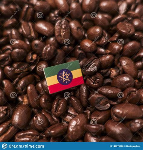 A Ethiopia Flag Placed Over Roasted Coffee Beans Stock Photo Image Of
