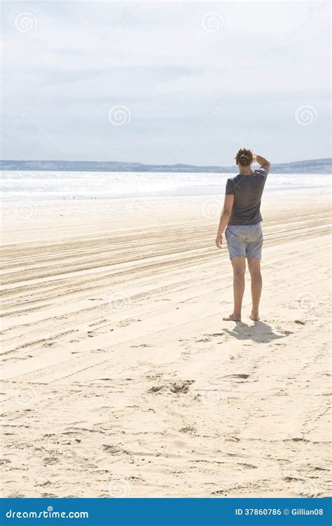 Man Standing On Beach Stock Photo Image Of Person Looking 37860786