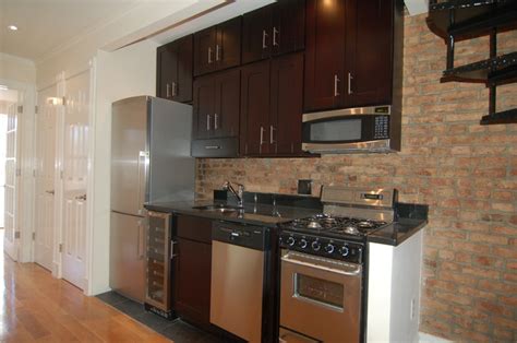 The Gorgeous Stainless Steel Kitchen And Exposed Brick In Apartment 10