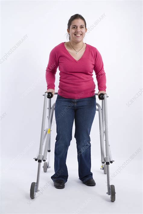 Young Woman With Cerebral Palsy Using A Walking Frame Stock Image C0467227 Science Photo