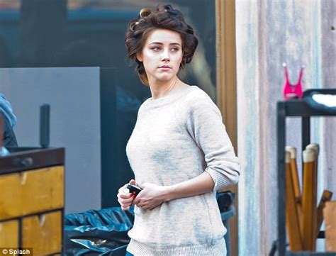 Amber Heard Still Looks Stunning With Her Newly Dark Hair In Curlers
