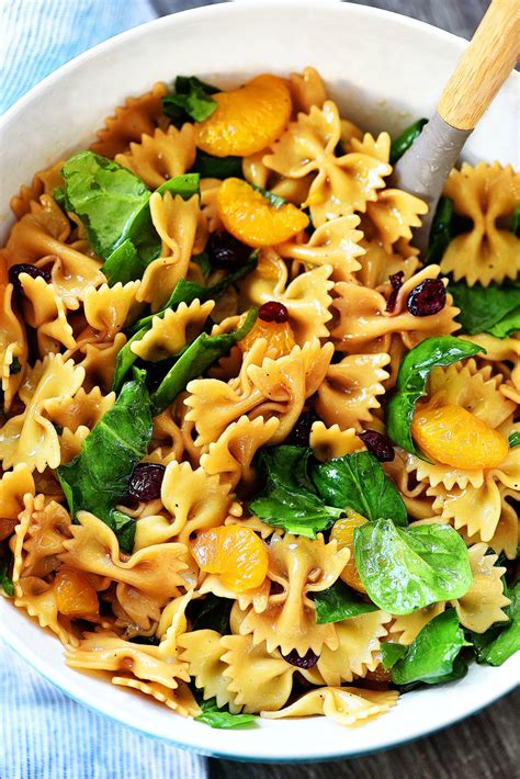 While pasta is cooking, prepare dressing, cover, shake and refrigerate. Mandarin Orange and Spinach Pasta Salad - Life In The ...
