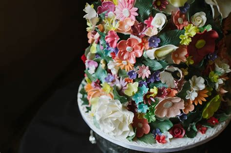 Unique Intricate Colorful Wedding Cake Edible Flowers Wedding Inspiration Board Junebug Weddings