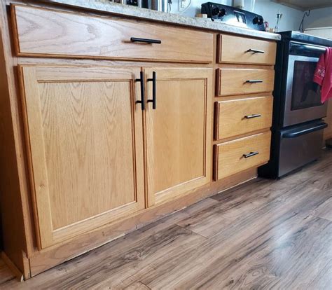 Black Kitchen Cabinet Handles On Oak Wood Black Kitchen Handles