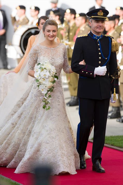 Although the ceremony involved in a royal wedding evokes long, ancient tradition, often the dress worn by the bride is reflective of contemporary for example, queen victoria wore a plain court dress whereas queen elizabeth wore a drop waist dress of ivory chiffon typical of the early 1920s fashion. 49 Iconic Royal Wedding Dresses Worn by Royal Brides - Glamour