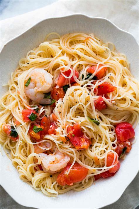 Add cooked pasta to the bowl and toss well to coat, spooning over juices 45 minutes, plus cooling. Pasta Pomodoro with Shrimp Recipe | SimplyRecipes.com
