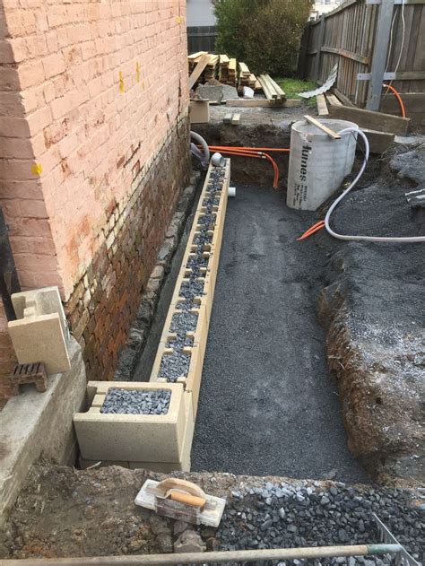 Property Drainage Works Retaining Wall Under Construction To Allow An