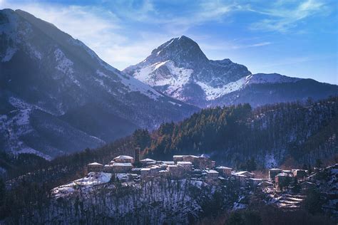 Snowy Village In Alpi Apuane Photograph By Stefano Orazzini Fine Art
