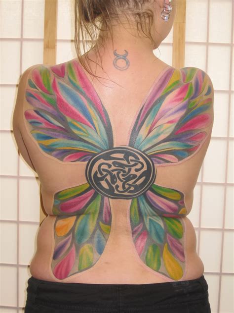 They represent the beautiful process of evolution. Hairstyles 2012: Beautiful Rose Tattoo Design for Women